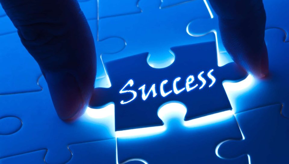 Success concept, Success word on puzzle piece with back light